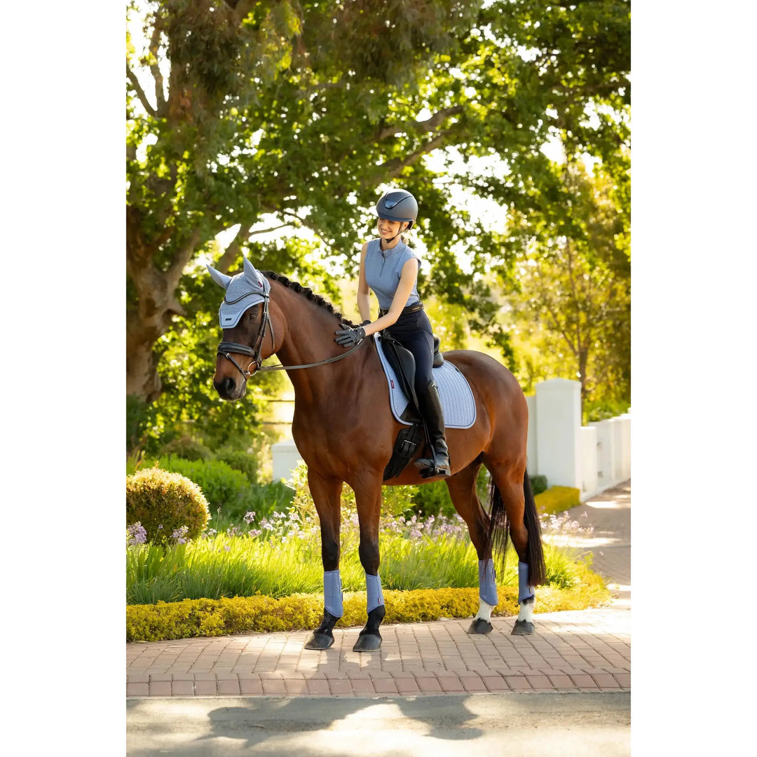 LeMieux Essence Dressurschabracke Fondant saddle pad in softshell Self-Cool, light blue on rider and horse