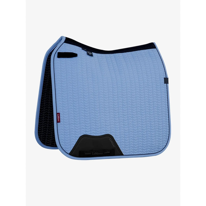 LeMieux Essence Dressage Saddle Pad in Fondant blue, quilted softshell with self-cool tech.